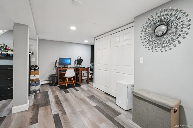 a room with furniture and gym equipment