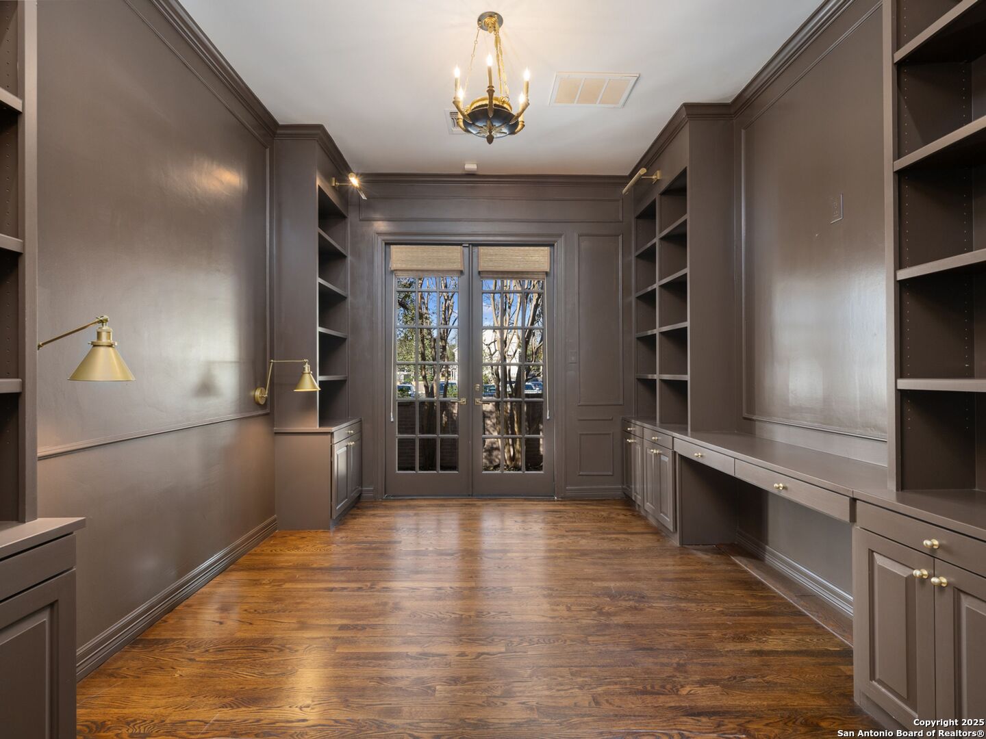 160 Burr Road San Antonio, TX 78209 - Photo 13 of 60 a view of a hallway to room with wooden floor and windows