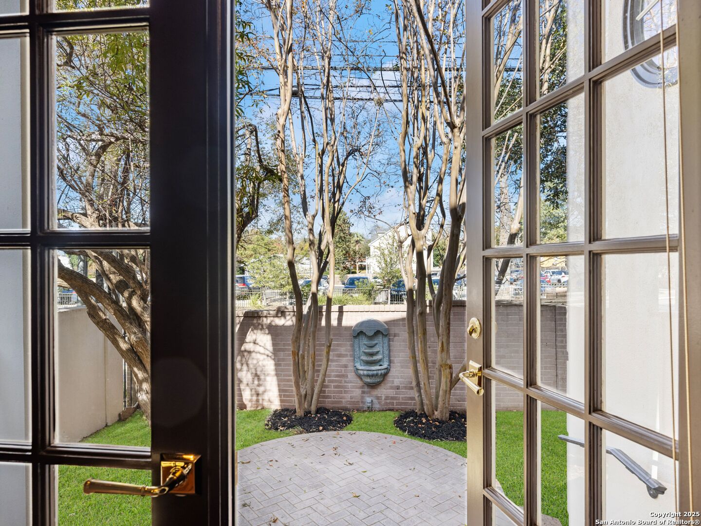 160 Burr Road San Antonio, TX 78209 - Photo 16 of 60 a view of a pathway of a building from a window