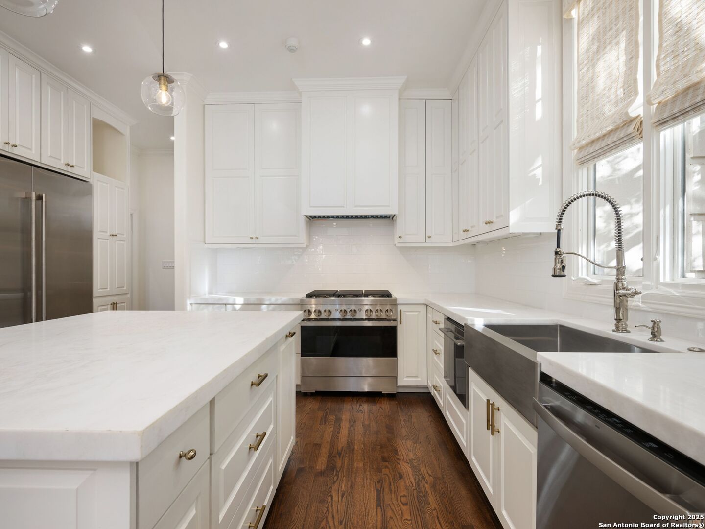 160 Burr Road San Antonio, TX 78209 - Photo 21 of 60 a kitchen with stainless steel appliances granite countertop a sink stove and refrigerator
