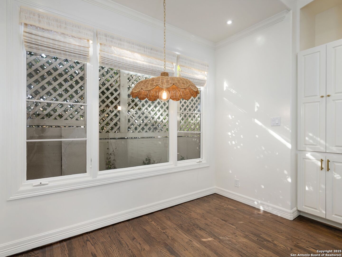 160 Burr Road San Antonio, TX 78209 - Photo 23 of 60 a view of a room with a window and wooden floor