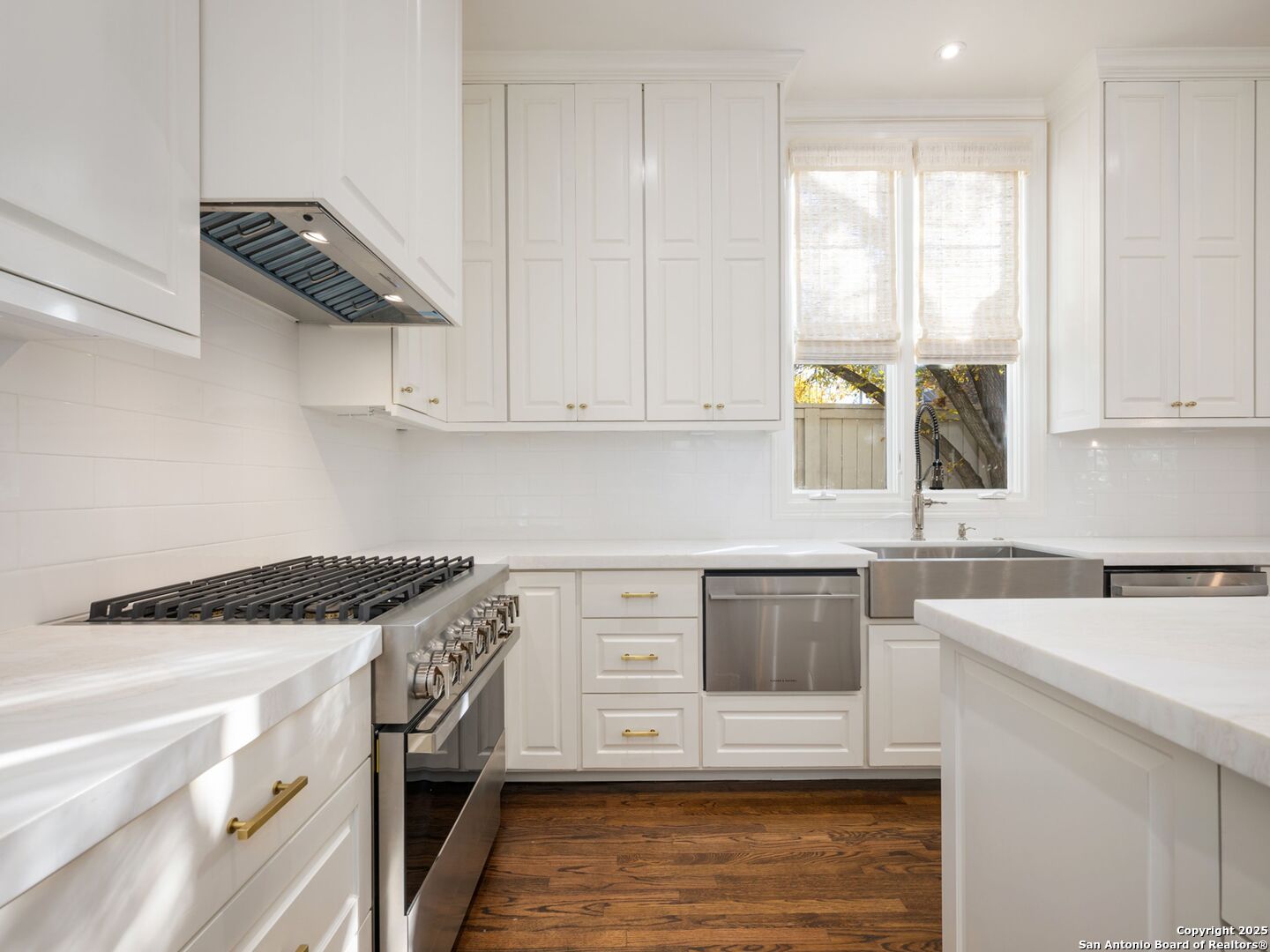 160 Burr Road San Antonio, TX 78209 - Photo 26 of 60 a kitchen with stainless steel appliances granite countertop a sink and a stove