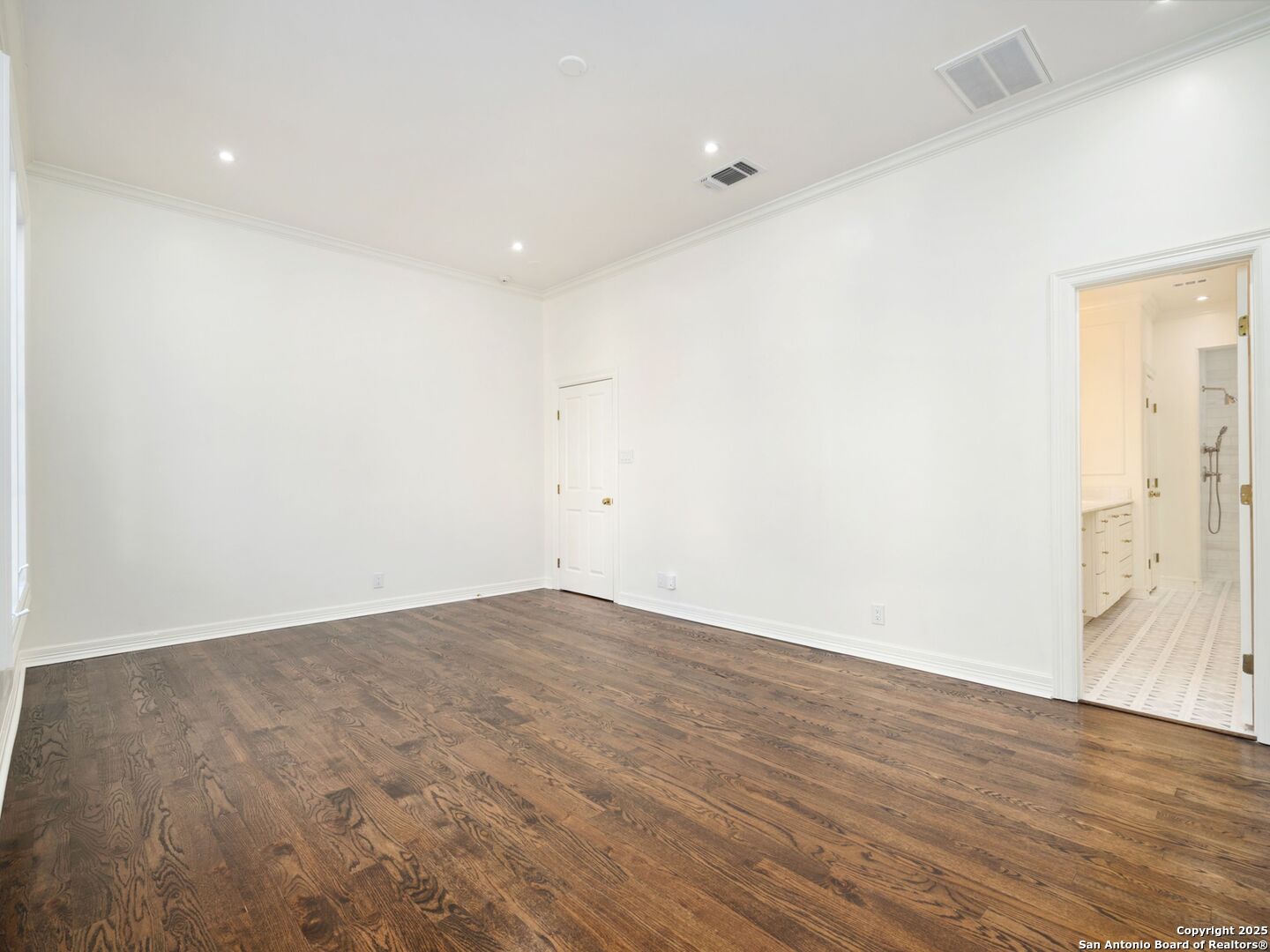 160 Burr Road San Antonio, TX 78209 - Photo 32 of 60 an empty room with wooden floor