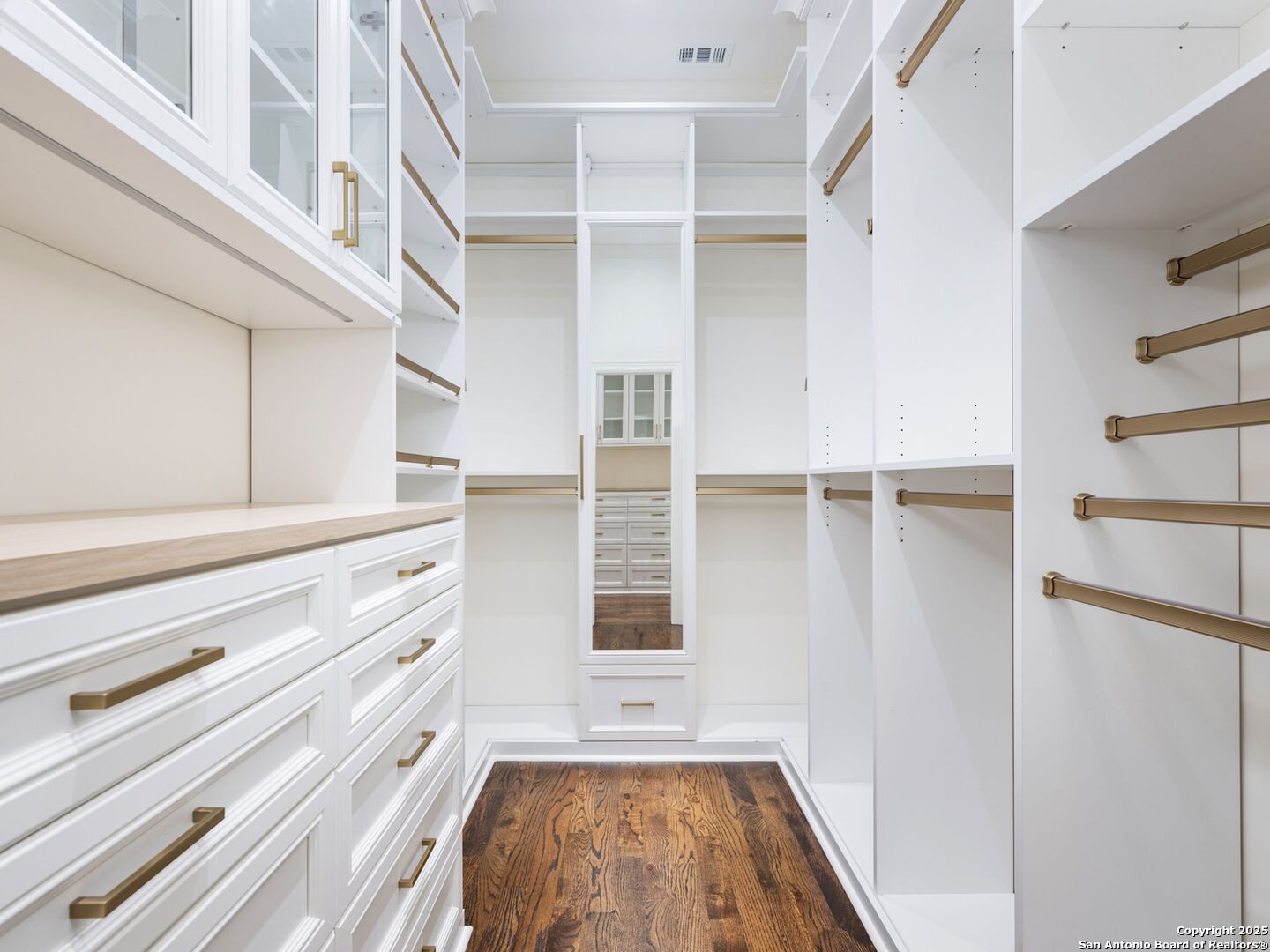 160 Burr Road San Antonio, TX 78209 - Photo 40 of 60 a view of walk in closet with empty racks