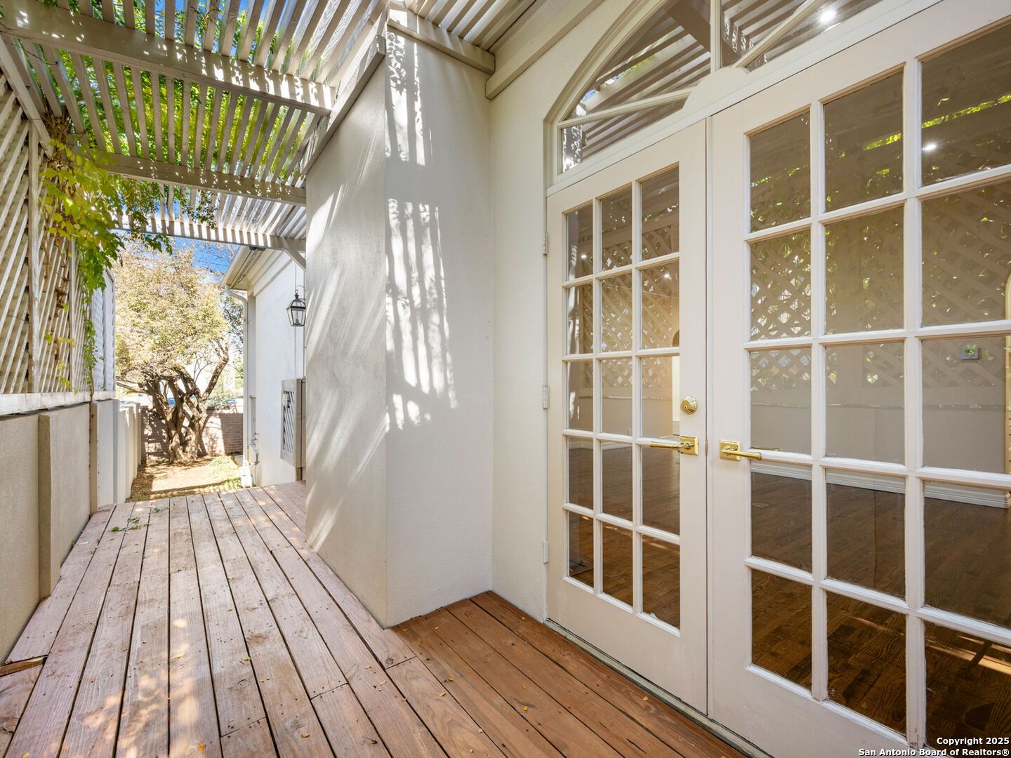 160 Burr Road San Antonio, TX 78209 - Photo 51 of 60 a view of balcony with wooden floor and door
