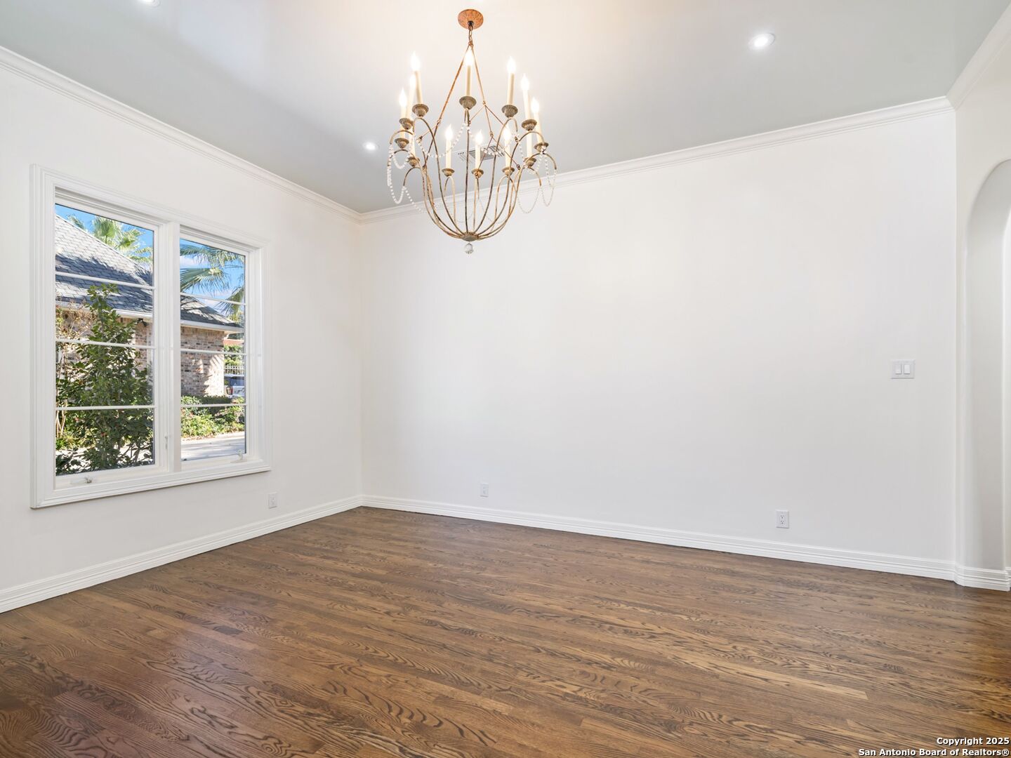 160 Burr Road San Antonio, TX 78209 - Photo 9 of 60 a view of a room with wooden floor and windows