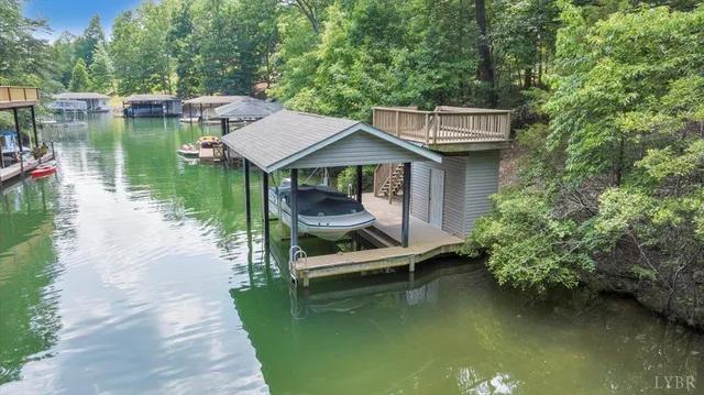 a backyard of a house with a lake view