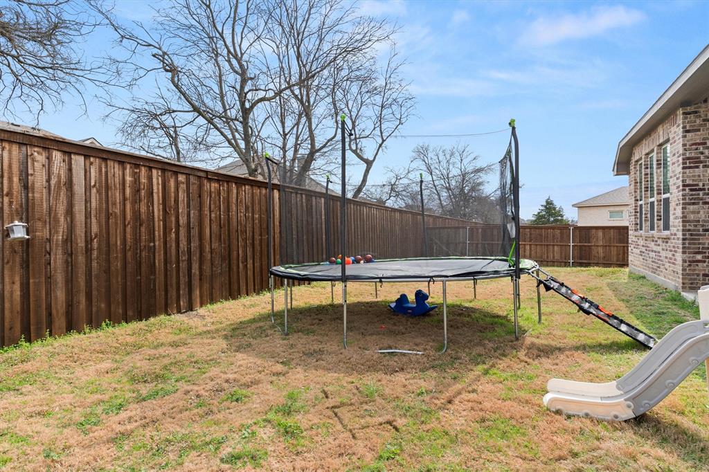 5823 Heatherwood Loop Sachse, TX 75048 - Photo 35 of 40 a view of outdoor space with seating