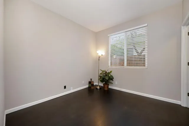 a view of a house with a yard and garage