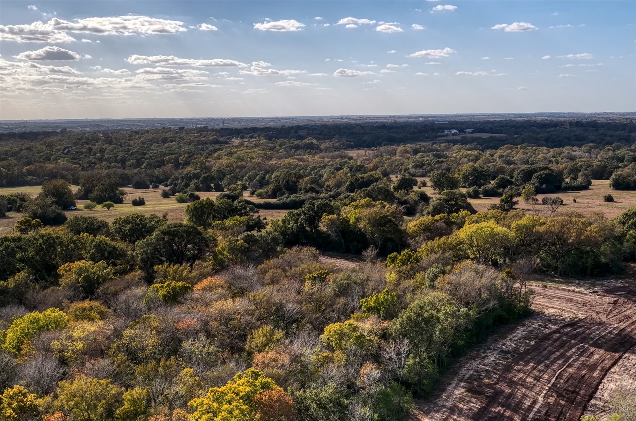 34 Windmill Ridge Brenham, TX 77833 - Photo 6 of 9 an aerial view of a city