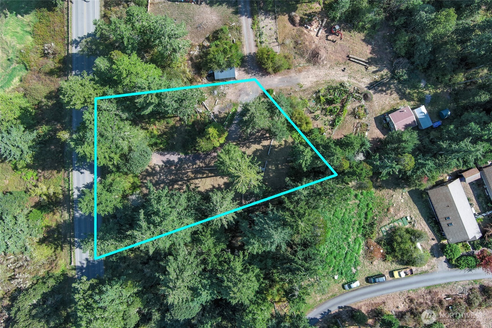 62 Quadra Lane Friday Harbor, WA 98250 - Photo 2 of 10 a view of a yard with a plant