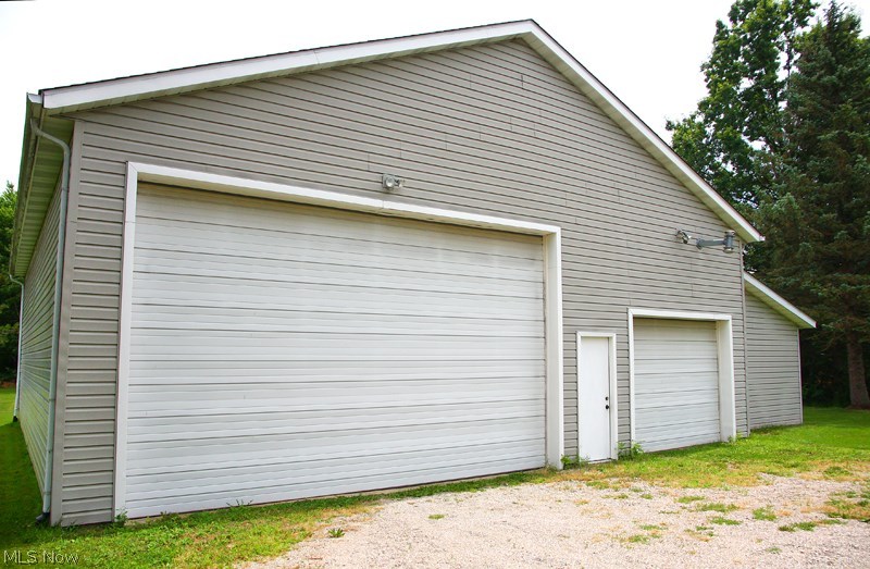 8901 Oberlin Road Elyria, OH 44035 - Photo 16 of 26 MASSIVE 50 x 48 OUT BUILDING! Heated, insulated, 220 amp service, extra storage area. A Dream Come true maker...
