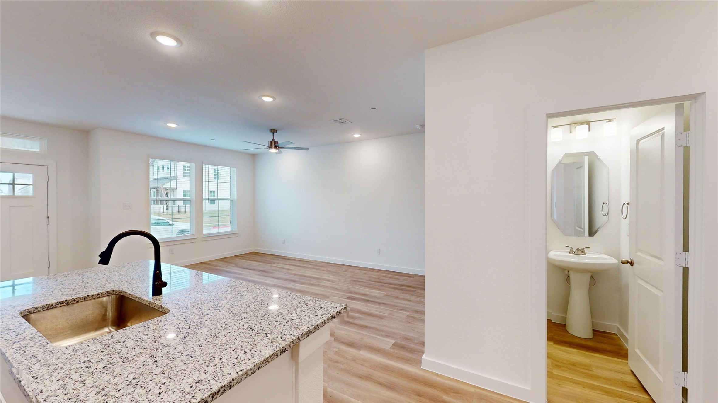 4118 Ruth Alley Grand Prairie, TX 75052 - Photo 18 of 42 a kitchen with a sink and natural light