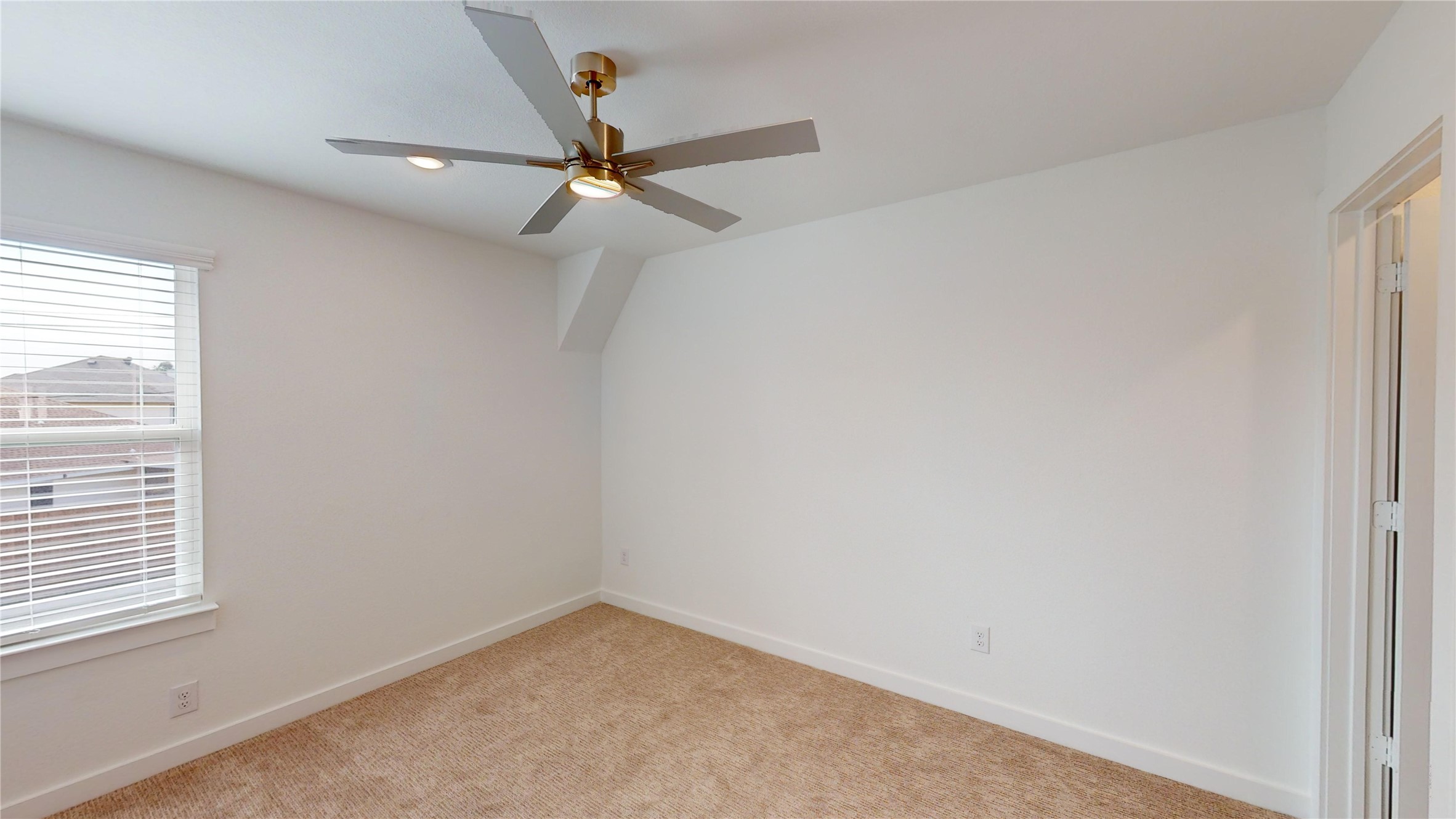 4118 Ruth Alley Grand Prairie, TX 75052 - Photo 22 of 42 an empty room with a window and a fan