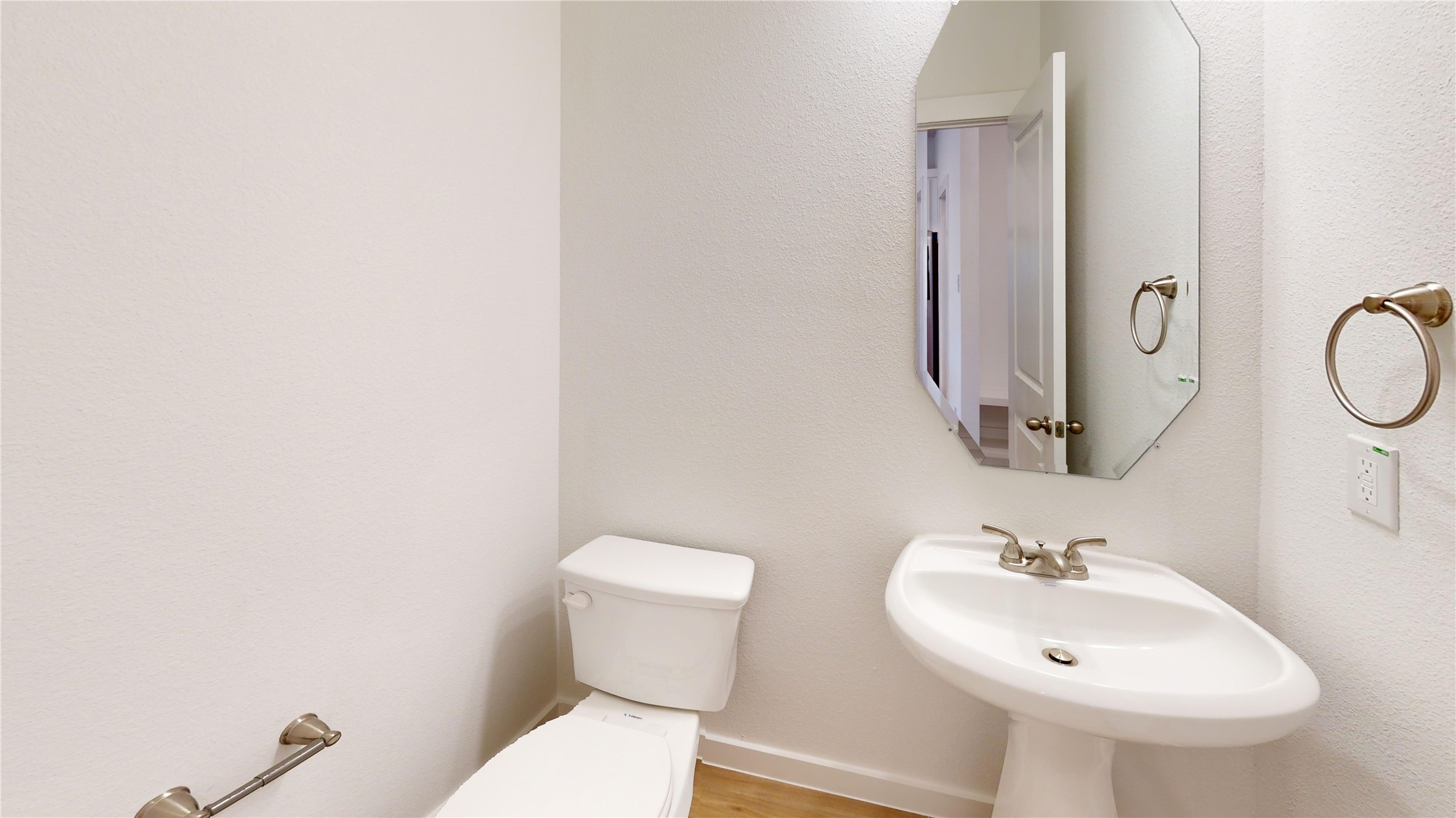 4118 Ruth Alley Grand Prairie, TX 75052 - Photo 31 of 42 a bathroom with a toilet sink and mirror