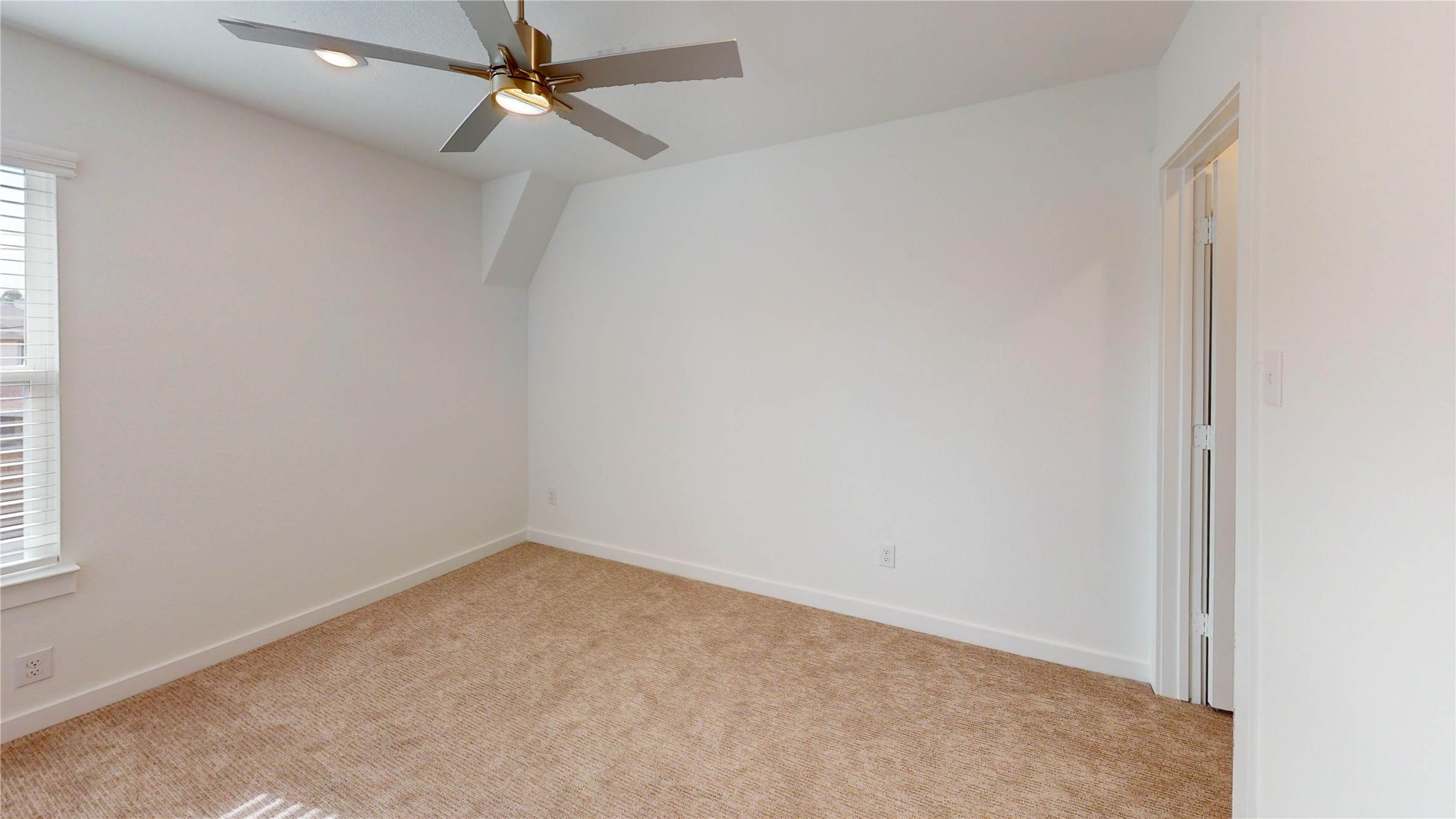 4118 Ruth Alley Grand Prairie, TX 75052 - Photo 32 of 42 an empty room with a window and a fan
