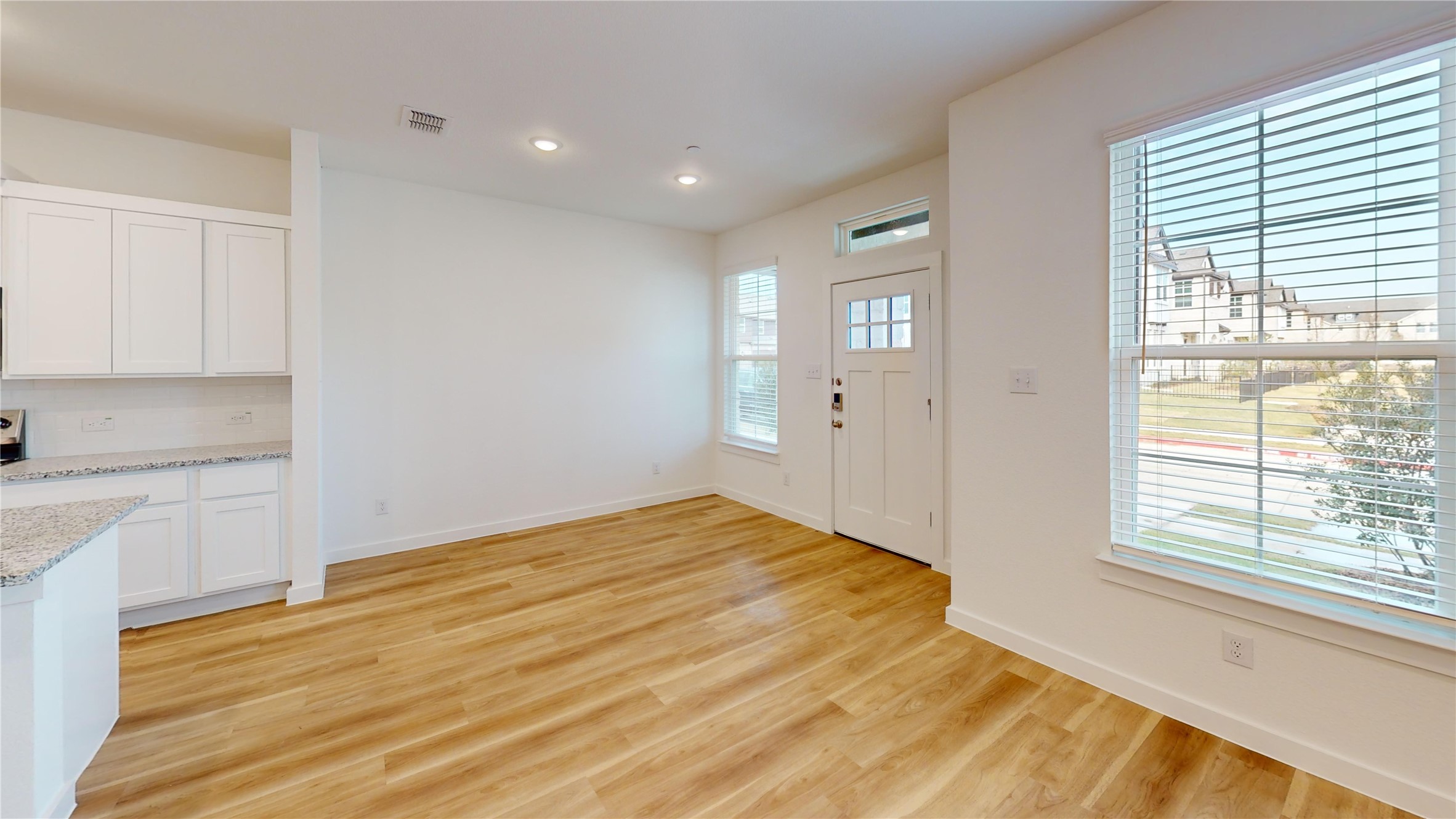 4118 Ruth Alley Grand Prairie, TX 75052 - Photo 39 of 42 a view of empty room with wooden floor and fan