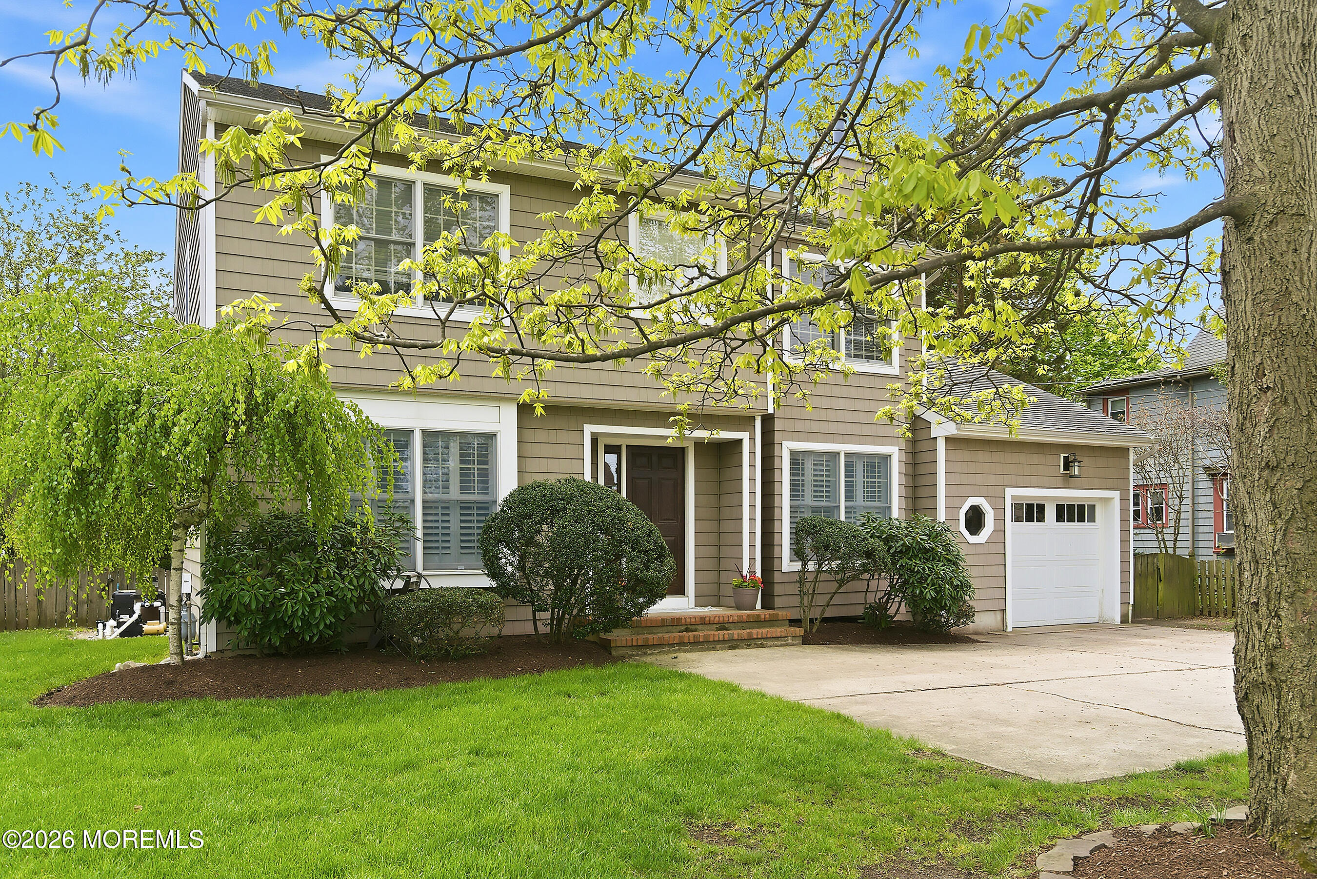 924 Ocean Road Point Pleasant, NJ 08742 - Photo 3 of 56 front view of a house with a garden
