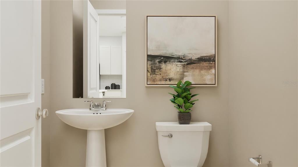 5154 Clay Whaley Road St. Cloud, FL 34772 - Photo 19 of 23 a bathroom with a sink a mirror and a shower