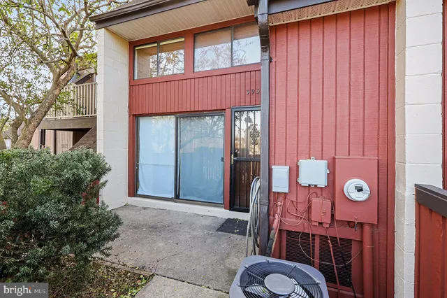 a front view of a house with a fence