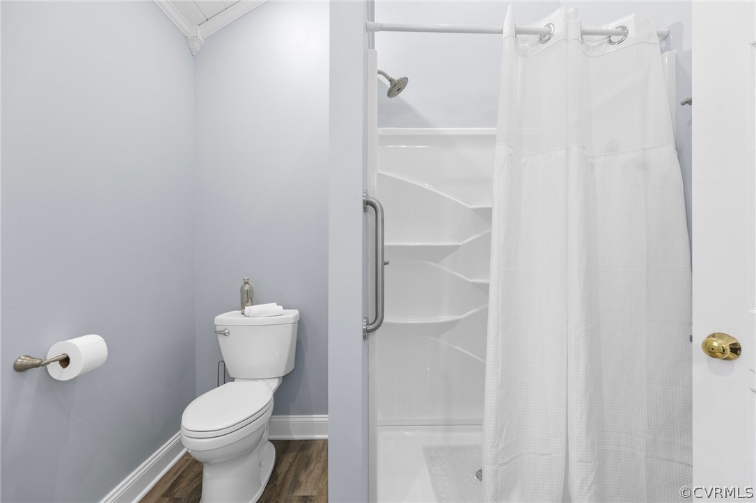 850 Watch Hill Road Midlothian, VA 23114 - Photo 19 of 32 a white toilet sitting next to a shower