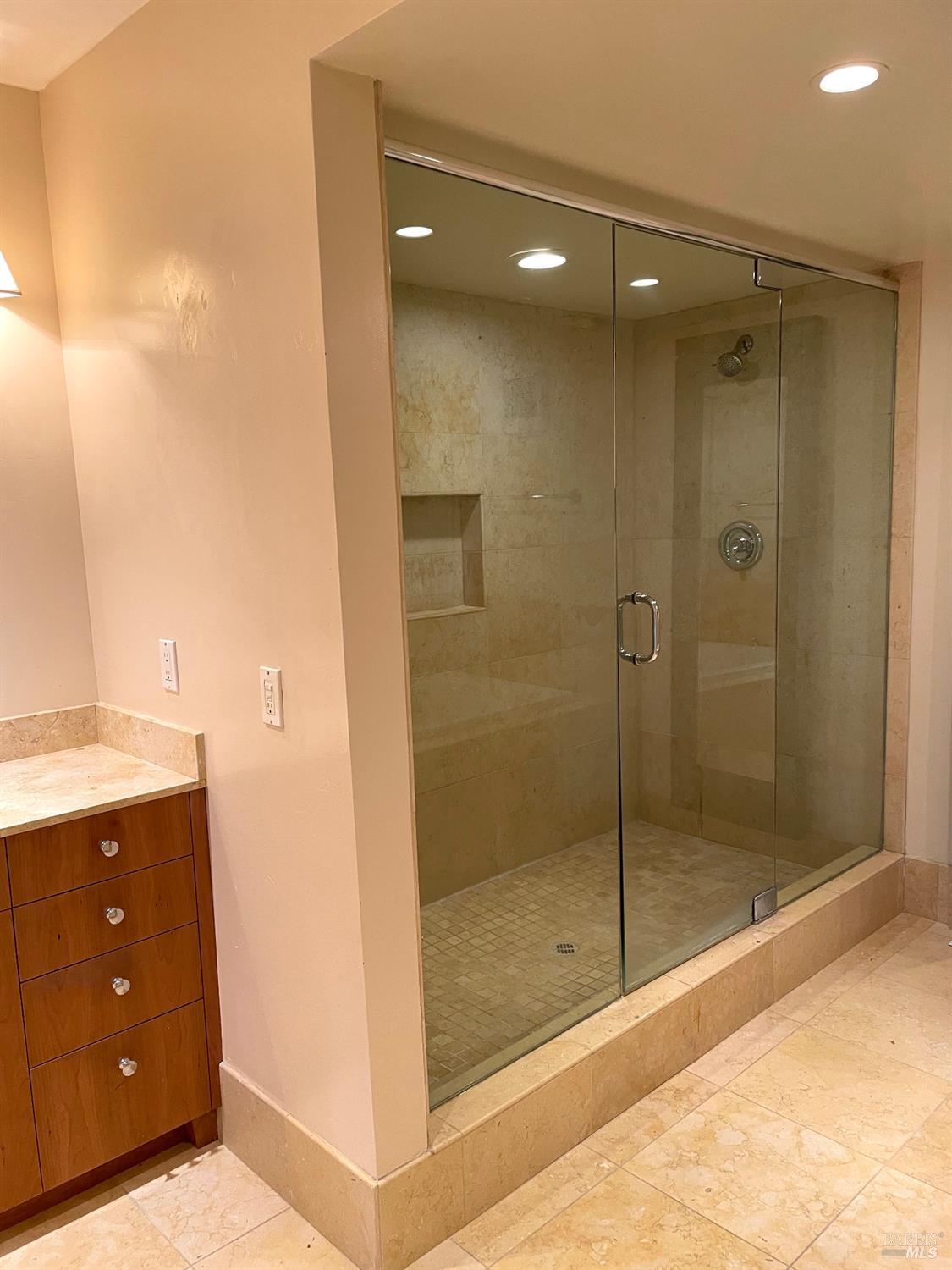 48 Marin Avenue Sausalito, CA 94965 - Photo 15 of 18 a bathroom with a shower and a sink
