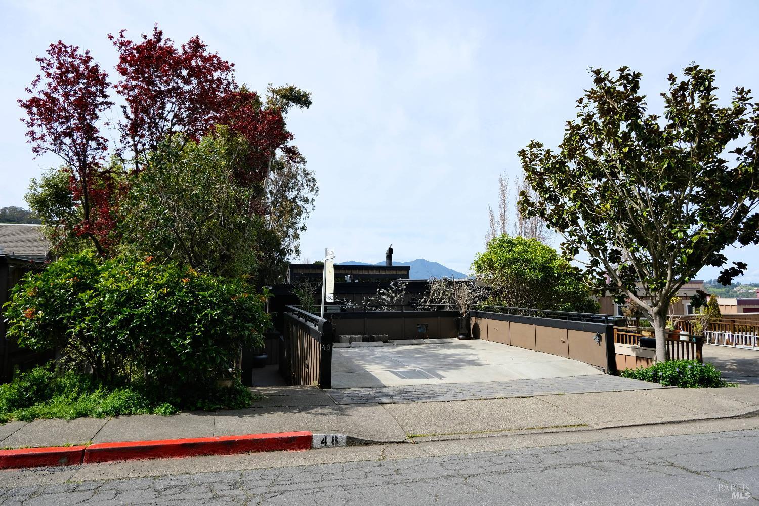 48 Marin Avenue Sausalito, CA 94965 - Photo 2 of 18 a view of a terrace with trees