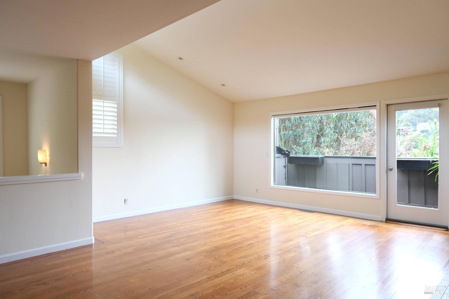 48 Marin Avenue Sausalito, CA 94965 - Photo 9 of 18 an empty room with large windows