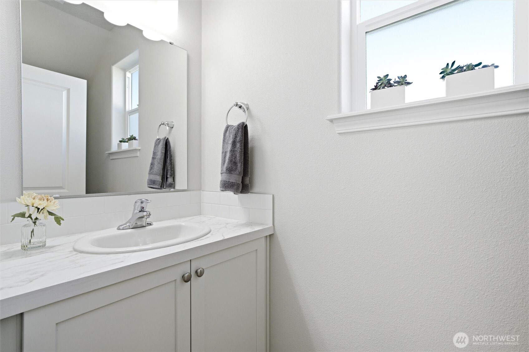 1106 Ava Street Walla Walla, WA 99362 - Photo 12 of 39 a bathroom with a sink and a mirror