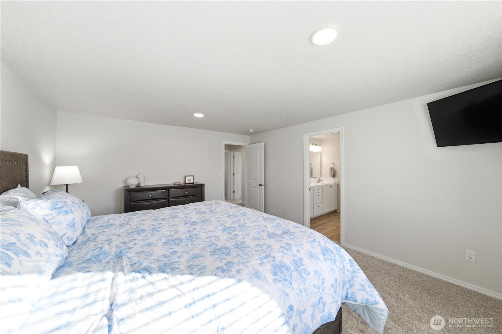 1106 Ava Street Walla Walla, WA 99362 - Photo 15 of 39 a bedroom with a bed and a flat screen tv