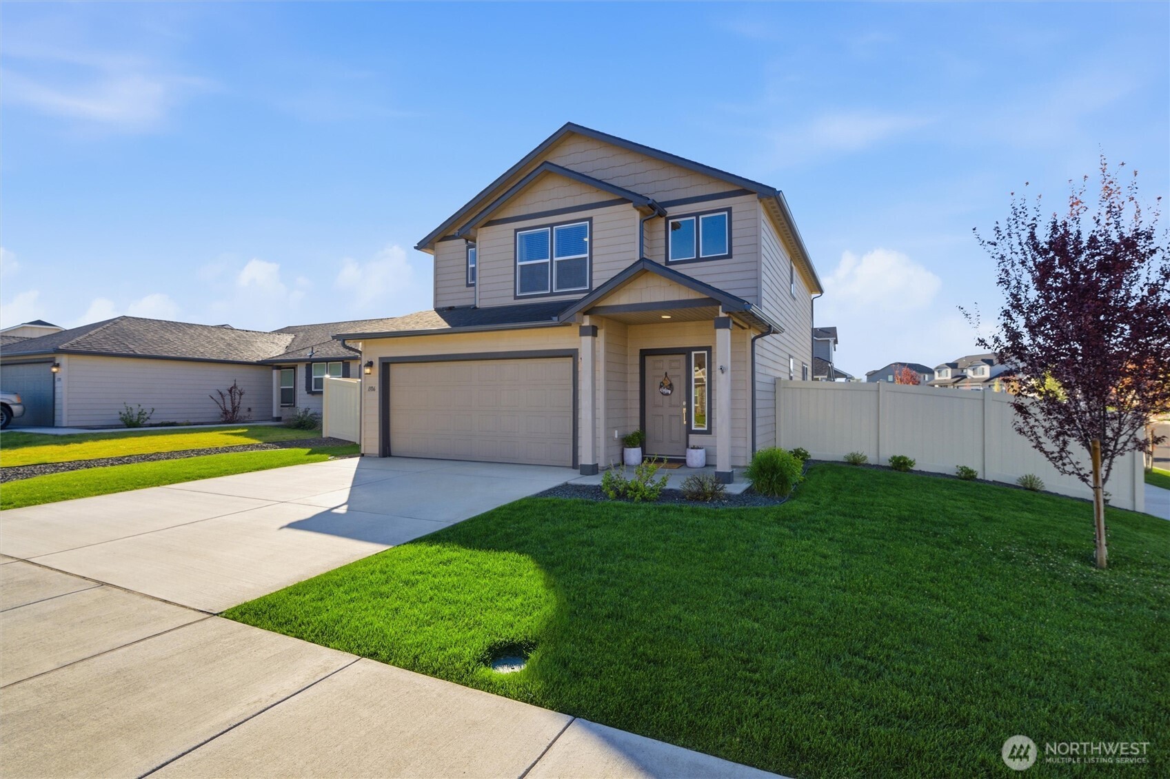 1106 Ava Street Walla Walla, WA 99362 - Photo 2 of 39 a view of a house with a big yard and large trees