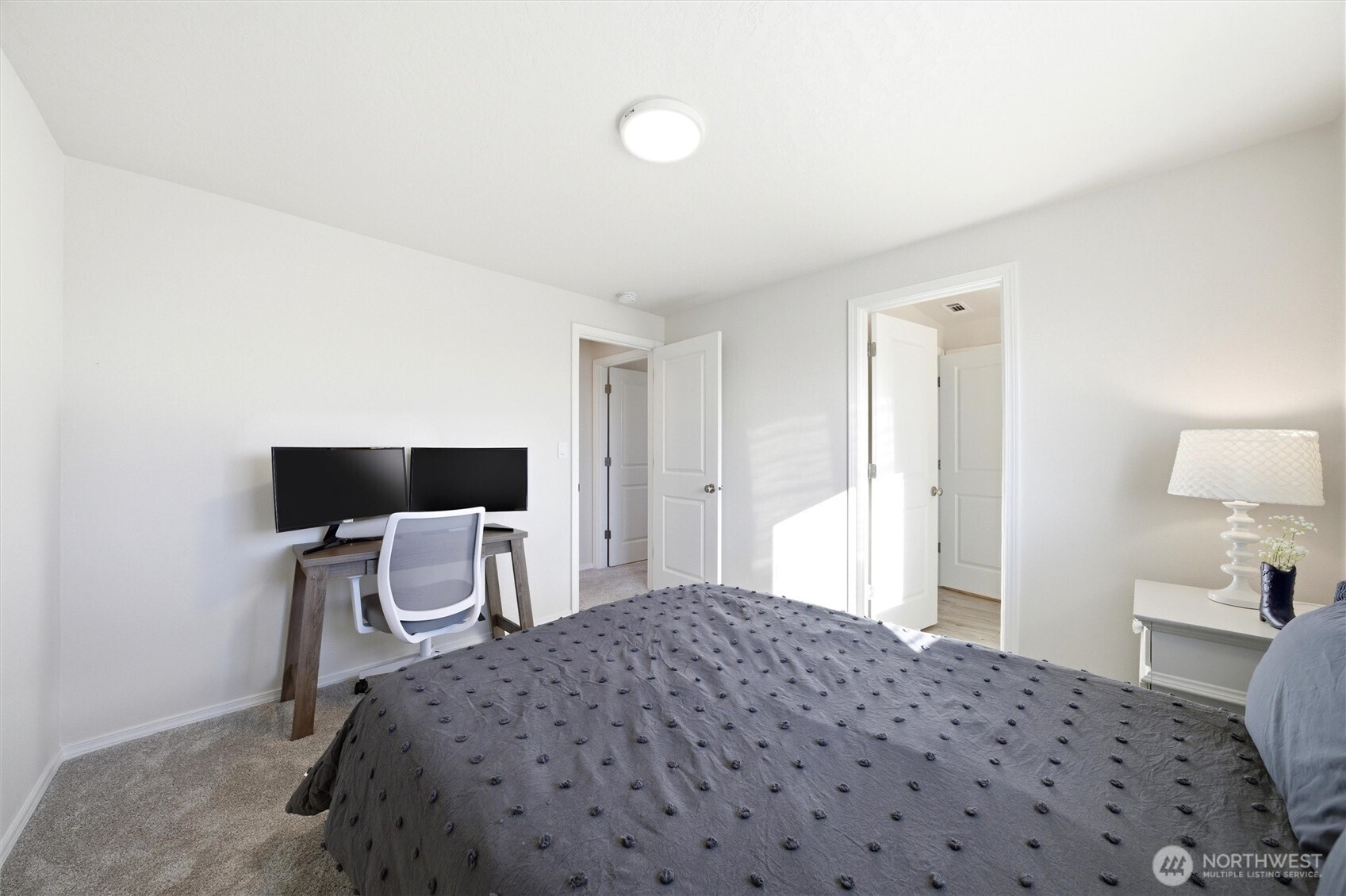 1106 Ava Street Walla Walla, WA 99362 - Photo 22 of 39 a bedroom with a bed and chair