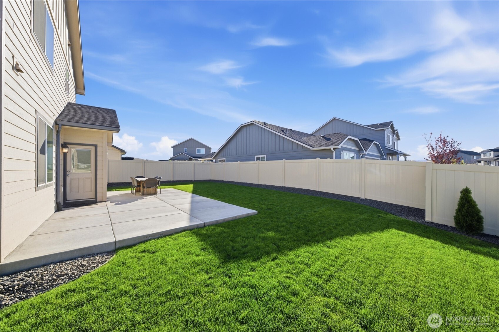 1106 Ava Street Walla Walla, WA 99362 - Photo 30 of 39 a view of a house with a backyard and a tub