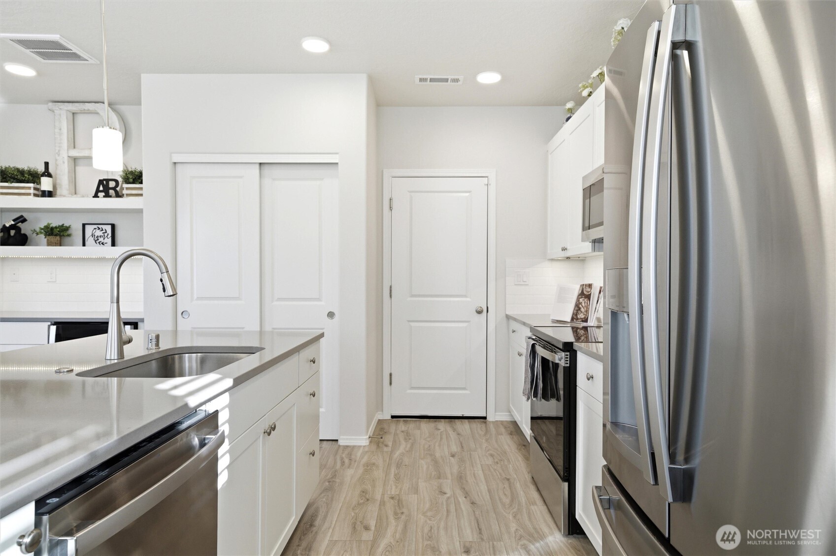 1106 Ava Street Walla Walla, WA 99362 - Photo 3 of 39 a kitchen with a sink appliances and cabinets