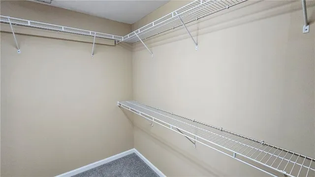 a view of a room with racks on the wall