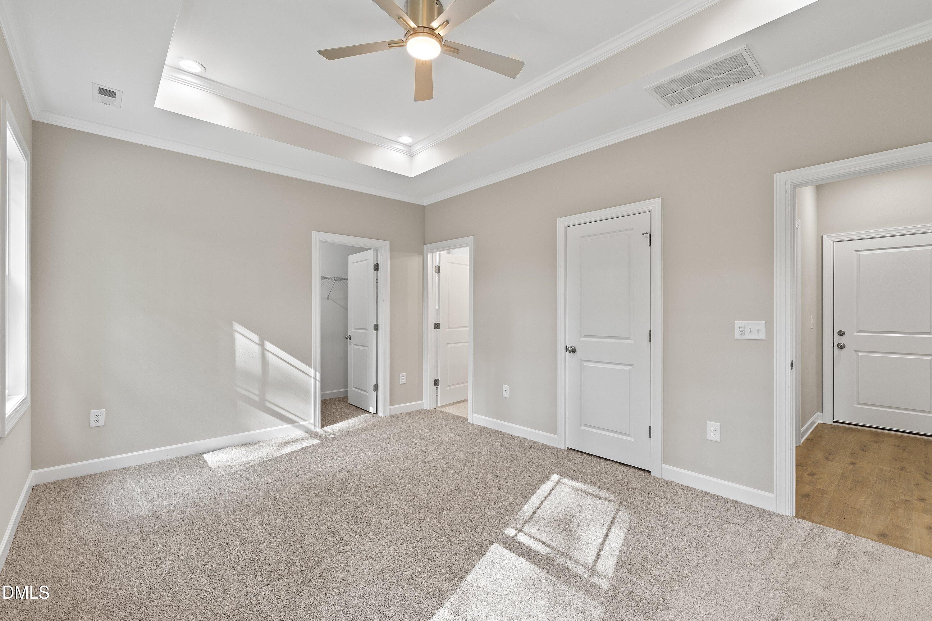 1115 Nor-Am Road Pikeville, NC 27863 - Photo 26 of 40 a view of a livingroom with a chandelier fan and a bathroom