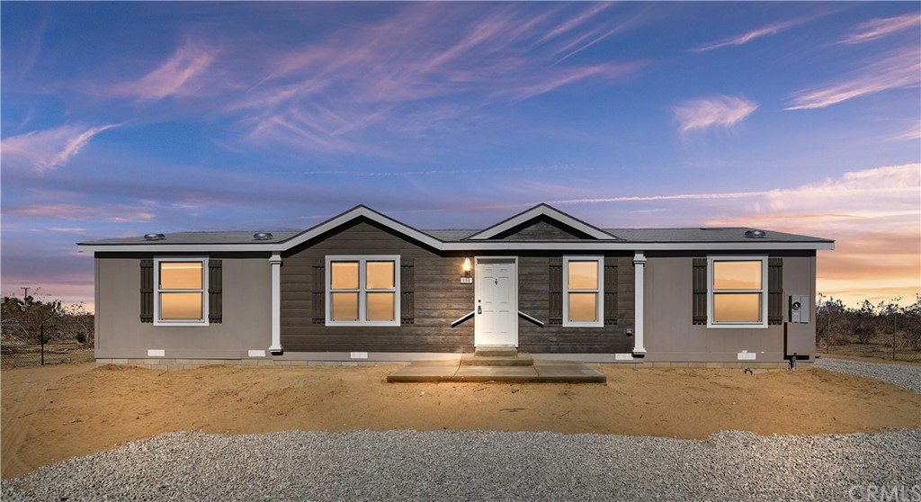 988 Duncan Road Pinon Hills, CA 92372 - Photo 1 of 1 a front view of a house with yard