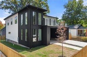 1030 Coleman Street Southwest Atlanta, GA 30310 - Photo 2 of 42 a front view of a house with garden