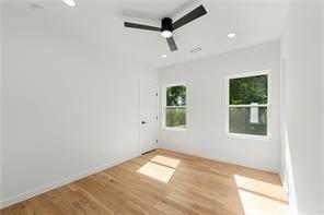 1030 Coleman Street Southwest Atlanta, GA 30310 - Photo 34 of 42 an empty room with a windows and ceiling fan