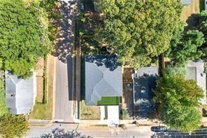 1030 Coleman Street Southwest Atlanta, GA 30310 - Photo 4 of 42 a front view of a house with a tree