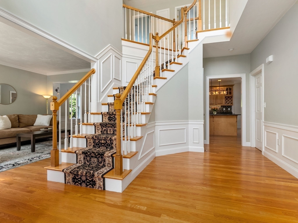 13 Breakneck Hill Road, Unit 1 Hopkinton, MA 01748 - Photo 7 of 37 a view of entryway and hall with wooden floor