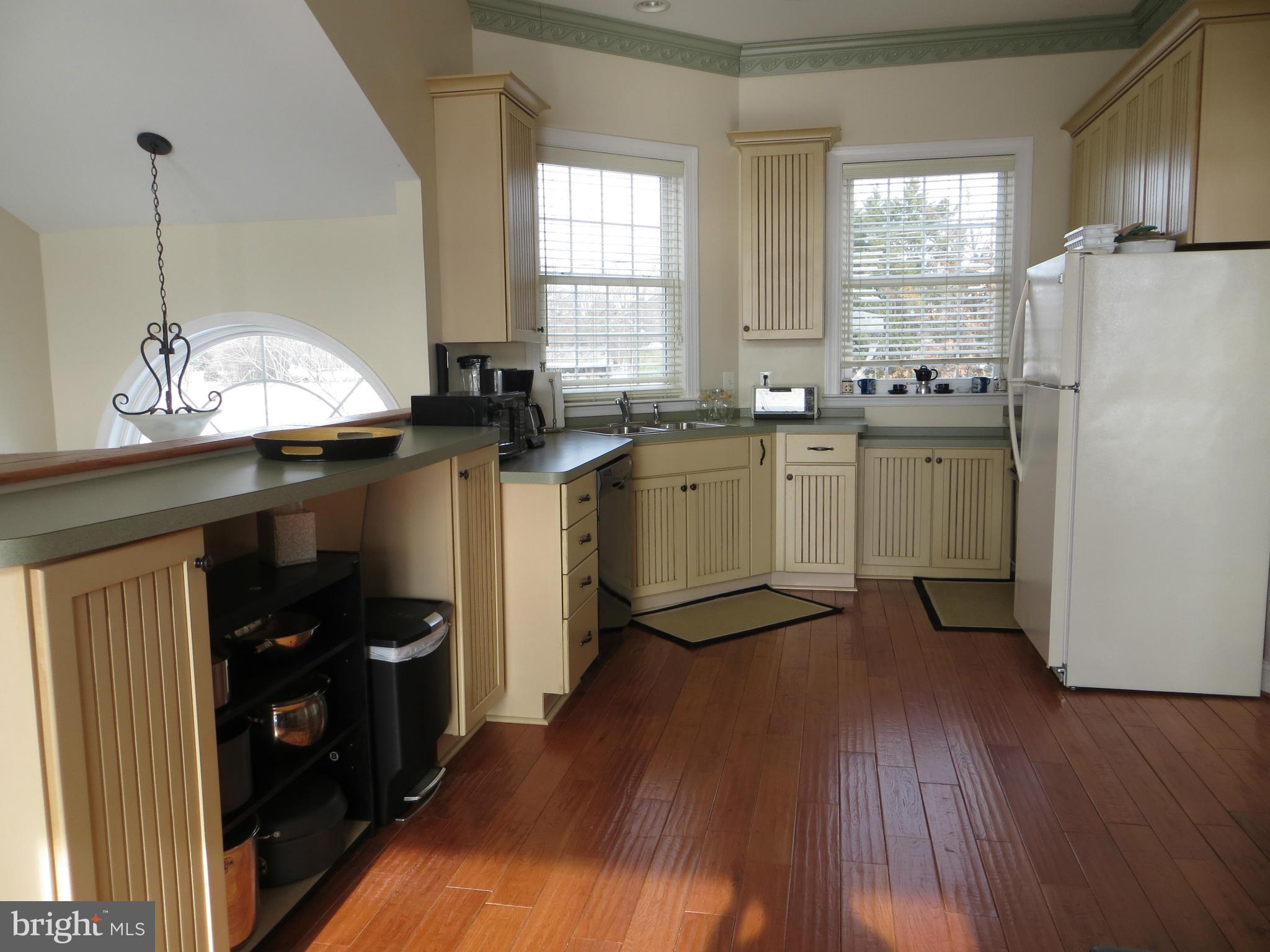 KITCHEN OPENS TO DINING/LIVING AREA