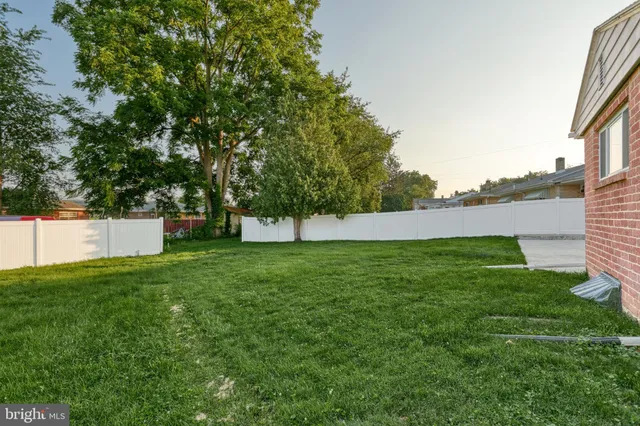 an aerial view of a house with pool