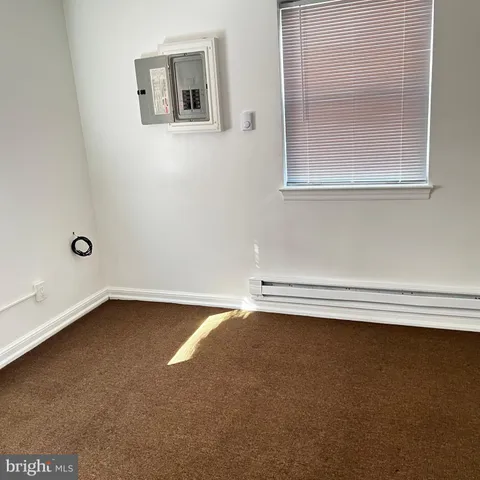 an empty room with a workbench