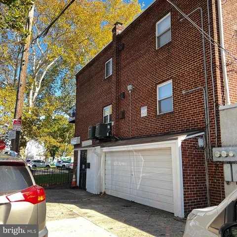 a house view with a backyard space