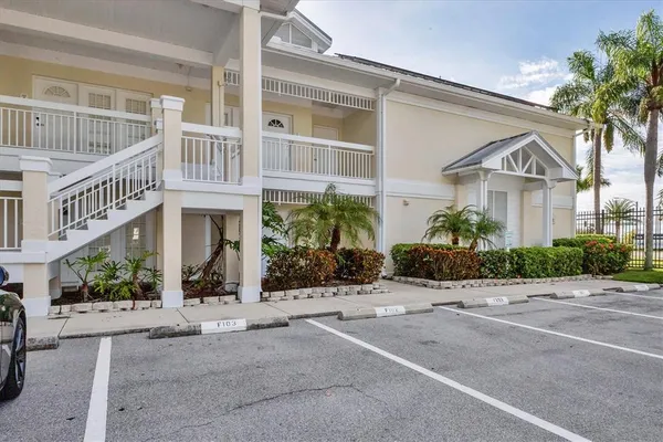 a view of a car parked in front of a building