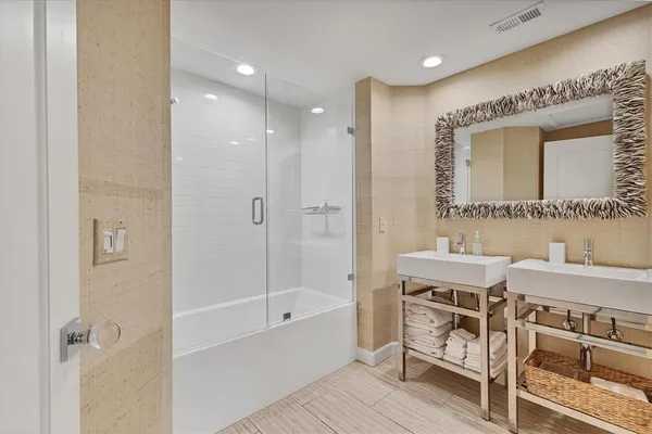 a bedroom with a bed and a walk in closet