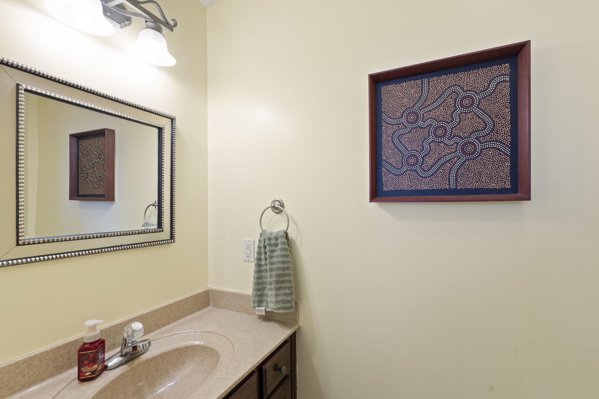 5037 Summit Drive Greenbrier, TN 37073 - Photo 19 of 53 a bathroom with a sink and a mirror