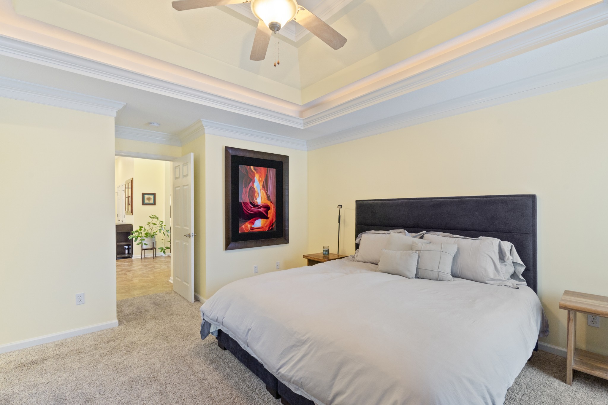 5037 Summit Drive Greenbrier, TN 37073 - Photo 33 of 53 a bedroom with a large bed and a chandelier