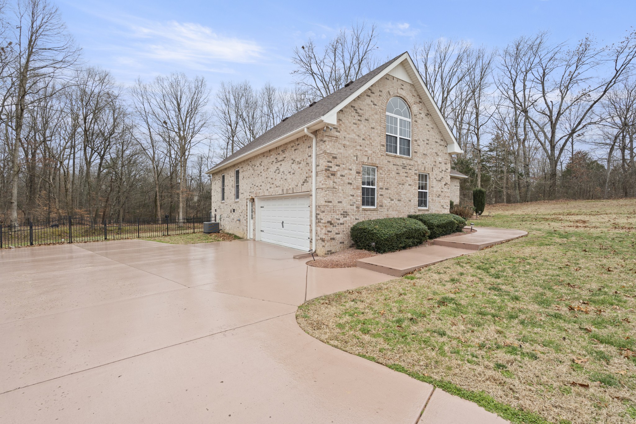5037 Summit Drive Greenbrier, TN 37073 - Photo 45 of 53 a view of a white house with a yard